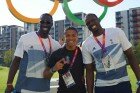 Luol Deng Luol Deng (right) with fellow Team GB basketball player ‘Pops’ Mensah- Bonsu (left) and Puerto Rican athlete Miguel Lopez Correa (centre) at the London 2012 Olympics. Photo by Eric Boateng.